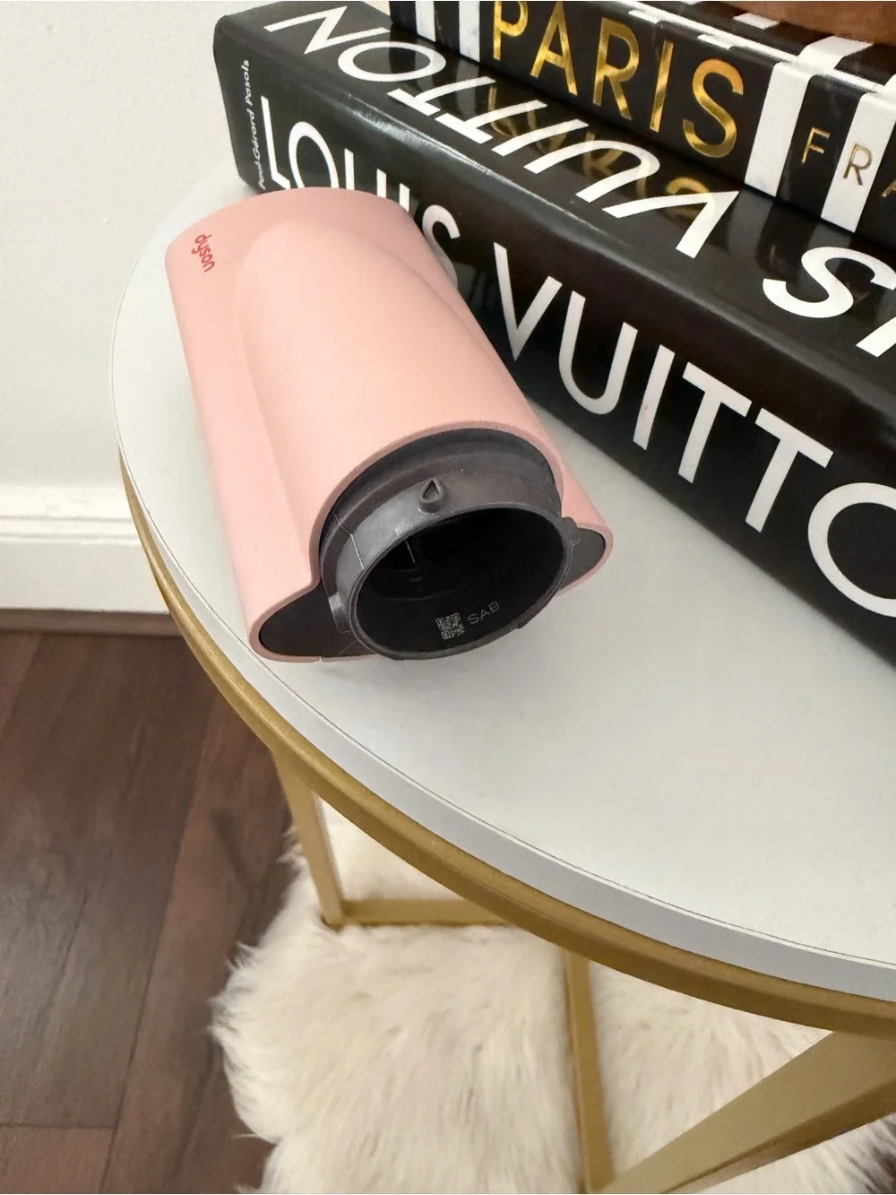 Dyson Smoothing turquoise, coral, black, and pink attachment